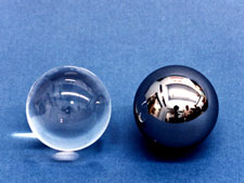 Two GP-B gyro rotors�uncoated fused quartz (left) and coated with niobium (right).