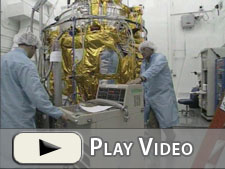 Spacecraft arrives in a satellite pre-launch preparation room at Vandenberg Air Force Base, CA